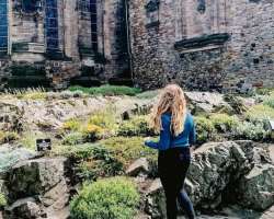 She loves traveling and exploring the world. She also shared some photographs of herself at Edinburgh Castle, United Kingdom with her Instagram follow